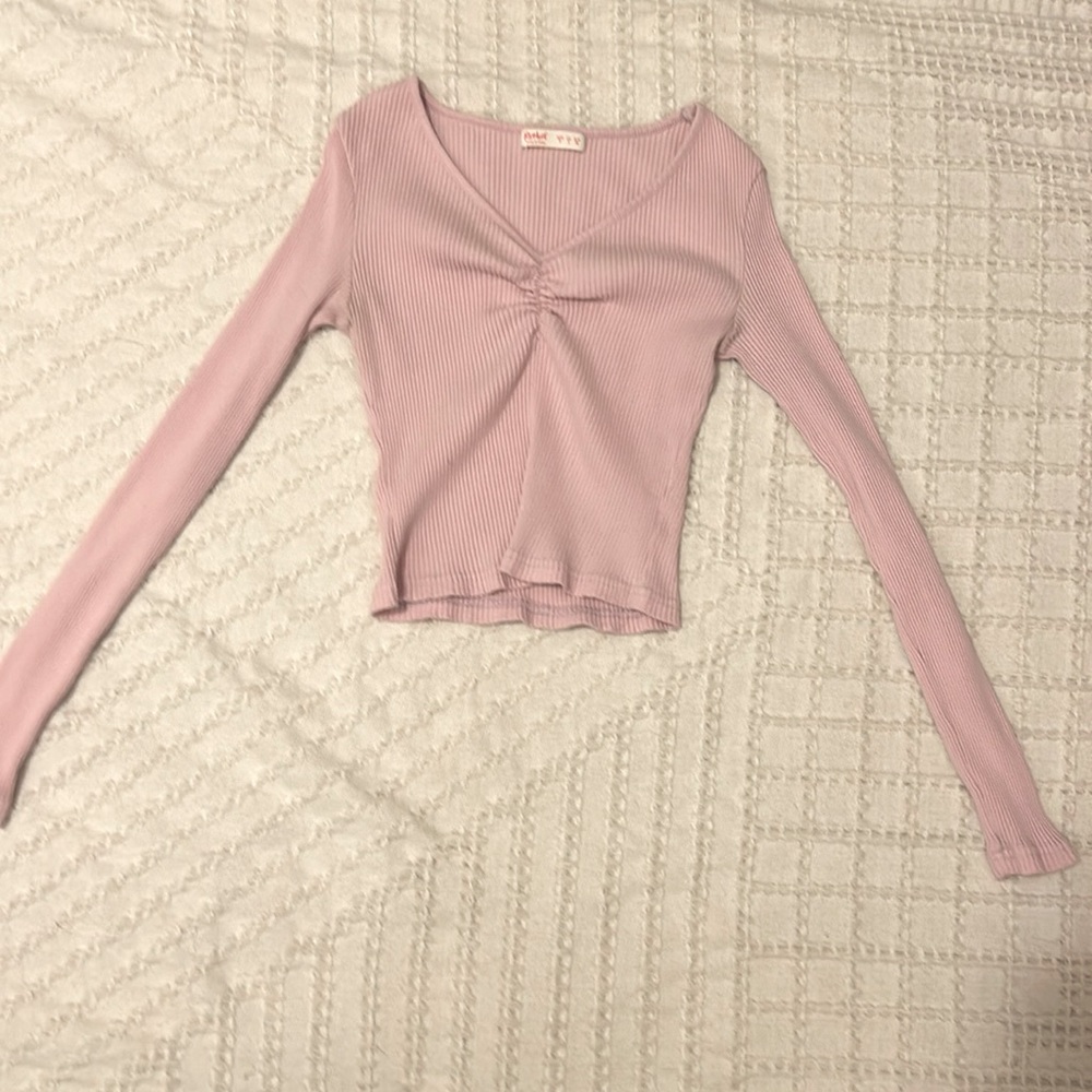 Brand is from romwe this shirt is really cute and pink
